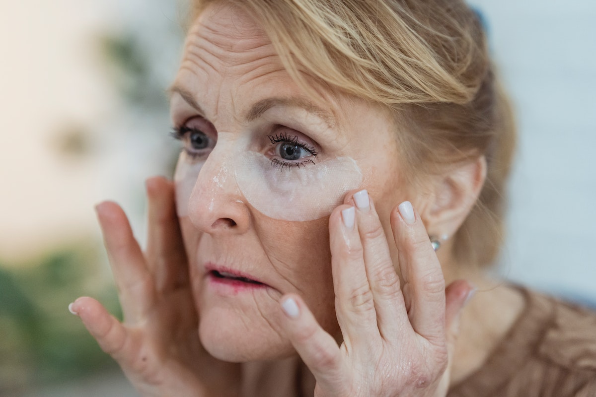 aged woman treating wrinkles